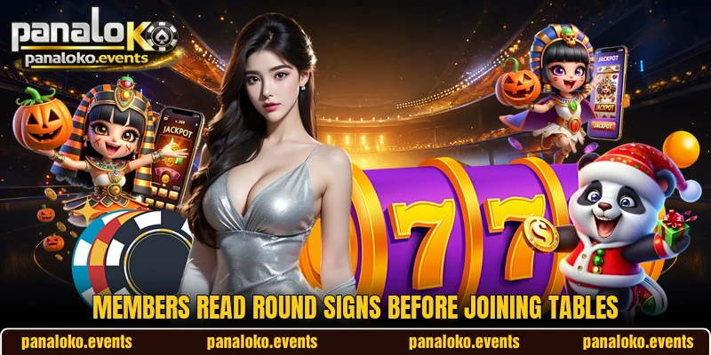 Members read round signs before joining tables